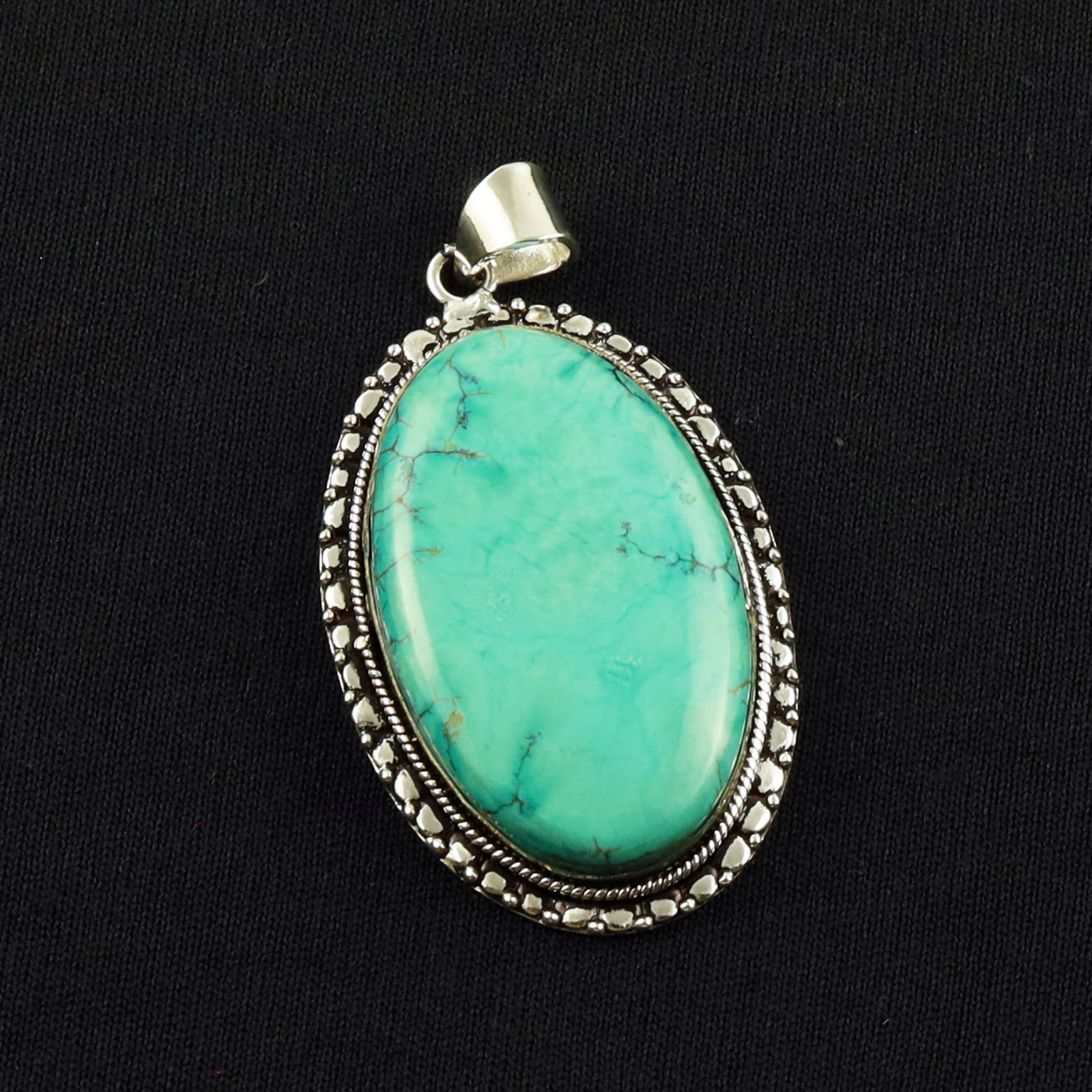 Natural Turquoise Sterling Silver Plated Handmade Pendant: Product ID: 260701140149 Product - Handmade Silver Plated Pendant Metal - 92.5 Sterling Silver Plated Pendant Size - 4.5x2.5 CM Gemstone - Turquoise Gemstone Origin - Tibet Gemstone Shape - Oval Penda