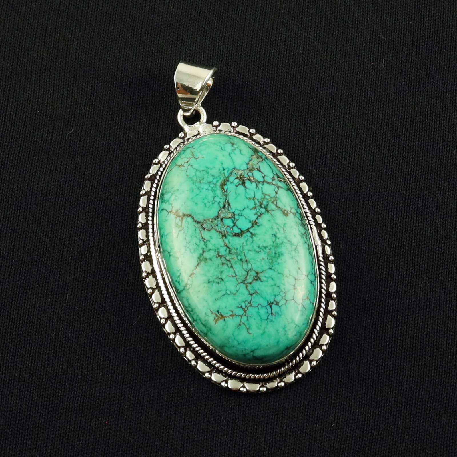 Natural Turquoise Sterling Silver Plated Handmade Pendant: Product ID: 260701140047 Product - Handmade Silver Plated Pendant Metal - 92.5 Sterling Silver Plated Pendant Size - 4.5x2.5 CM Gemstone - Turquoise Gemstone Origin - Tibet Gemstone Shape - Oval Penda