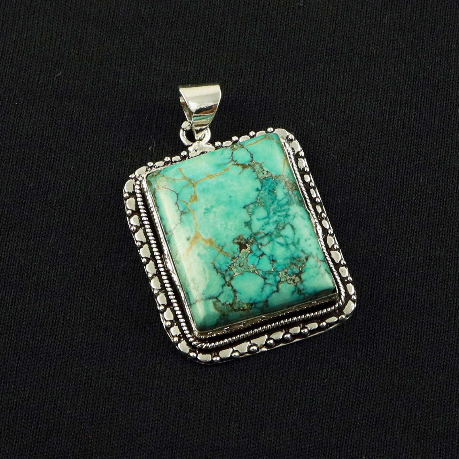 Natural Turquoise Sterling Silver Plated Handmade Pendant: Product ID: 260701135948 Product - Handmade Silver Plated Pendant Metal - 92.5 Sterling Silver Plated Pendant Size - 3x2.5 CM Gemstone - Turquoise Gemstone Origin - Tibet Gemstone Shape - Square Penda