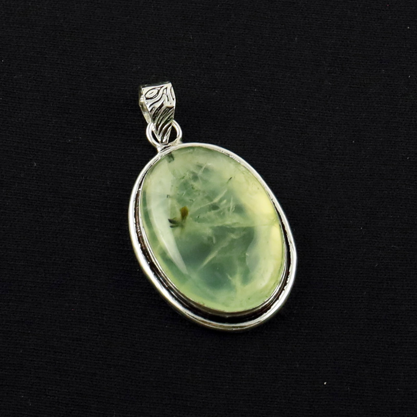 Natural Prehnite Sterling Silver Plated Handmade Pendant: Product ID: 260619173317 Product - Handmade Silver Plated Pendant Metal - 92.5 Sterling Silver Plated Pendant Size - 3X2 CM Gemstone - Prehnite Gemstone Origin - South Africa Gemstone Shape - Oval Pen