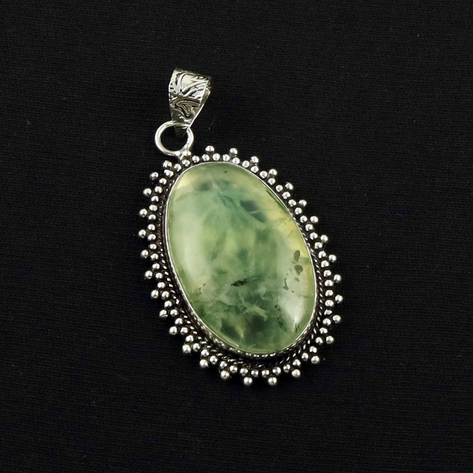 Natural Prehnite Sterling Silver Plated Handmade Pendant: Product ID: 260619173226 Product - Handmade Silver Plated Pendant Metal - 92.5 Sterling Silver Plated Pendant Size - 3.5X2 CM Gemstone - Prehnite Gemstone Origin - South Africa Gemstone Shape - Oval P