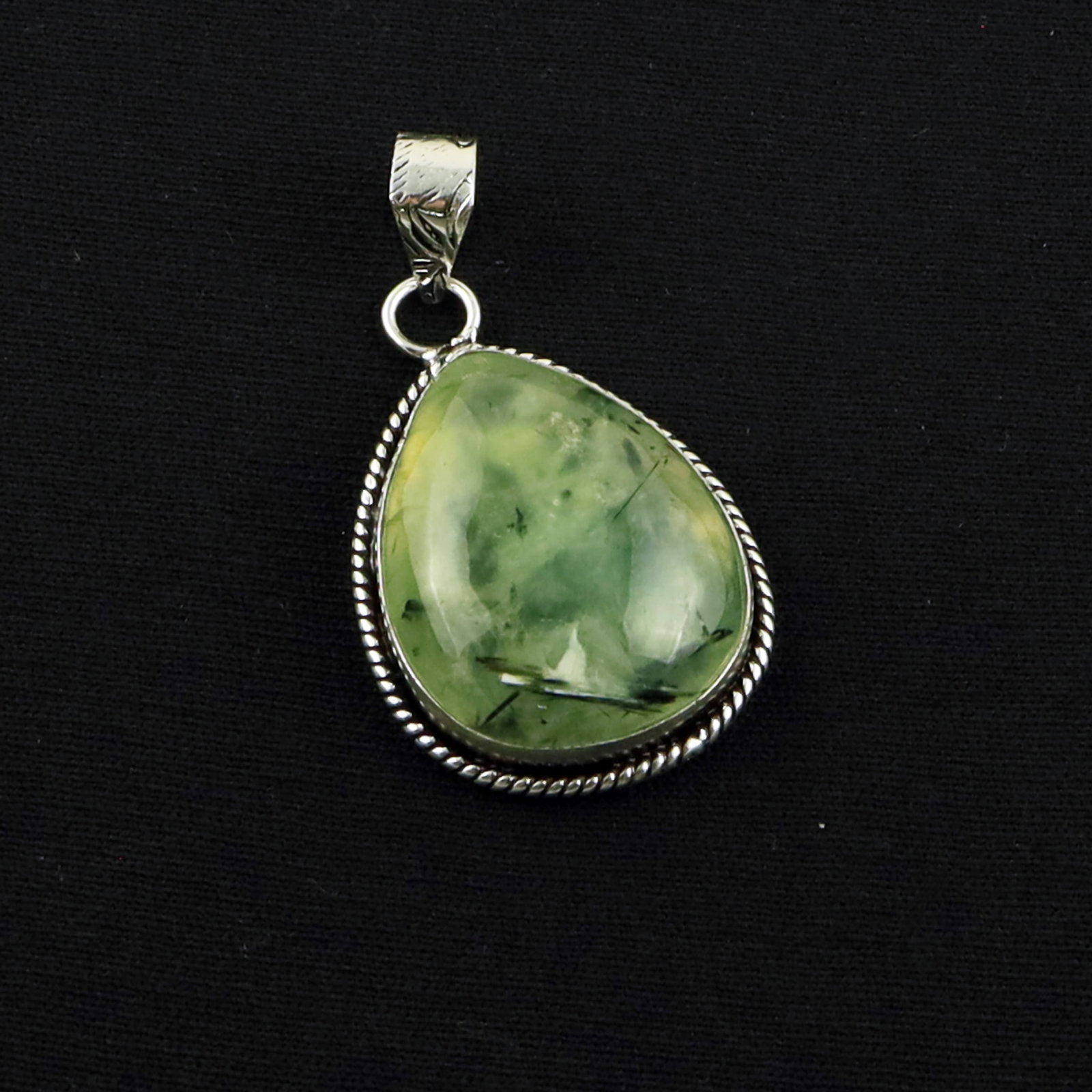 Natural Prehnite Sterling Silver Plated Handmade Pendant: Product ID: 260619172921 Product - Handmade Silver Plated Pendant Metal - 92.5 Sterling Silver Plated Pendant Size - 2.5X2 CM Gemstone - Prehnite Gemstone Origin - South Africa Gemstone Shape - Pear P