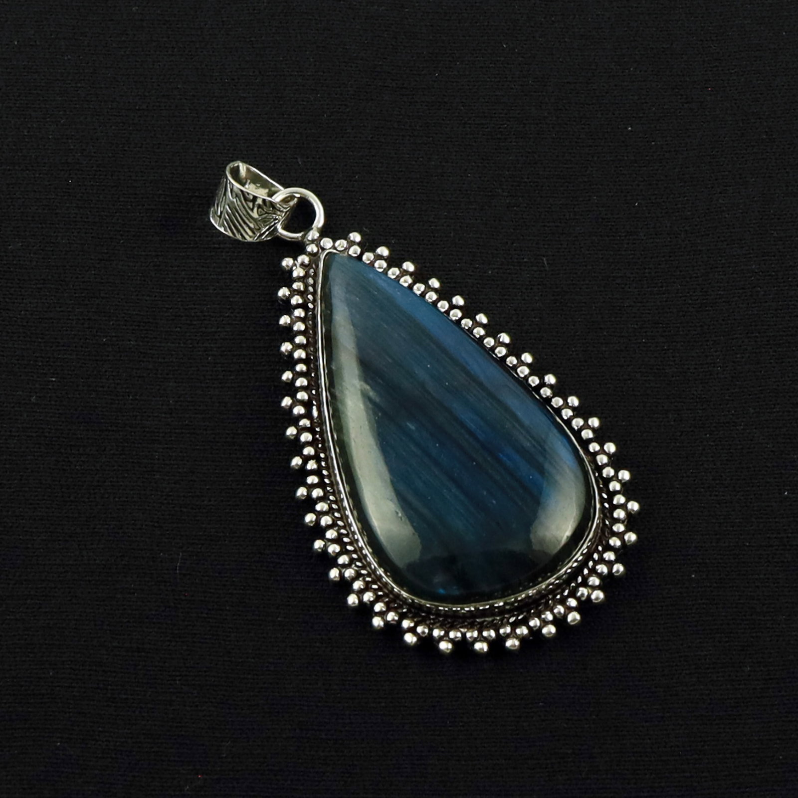 Natural Blue Labradorite Sterling Silver Plated Handmade Pendant: Product ID: 260619172514 Product - Handmade Silver Plated Pendant Metal - 92.5 Sterling Silver Plated Pendant Size - 4.5X2.5 CM Gemstone - Labradorite Gemstone Origin - Canada Gemstone Shape - Pear Pe