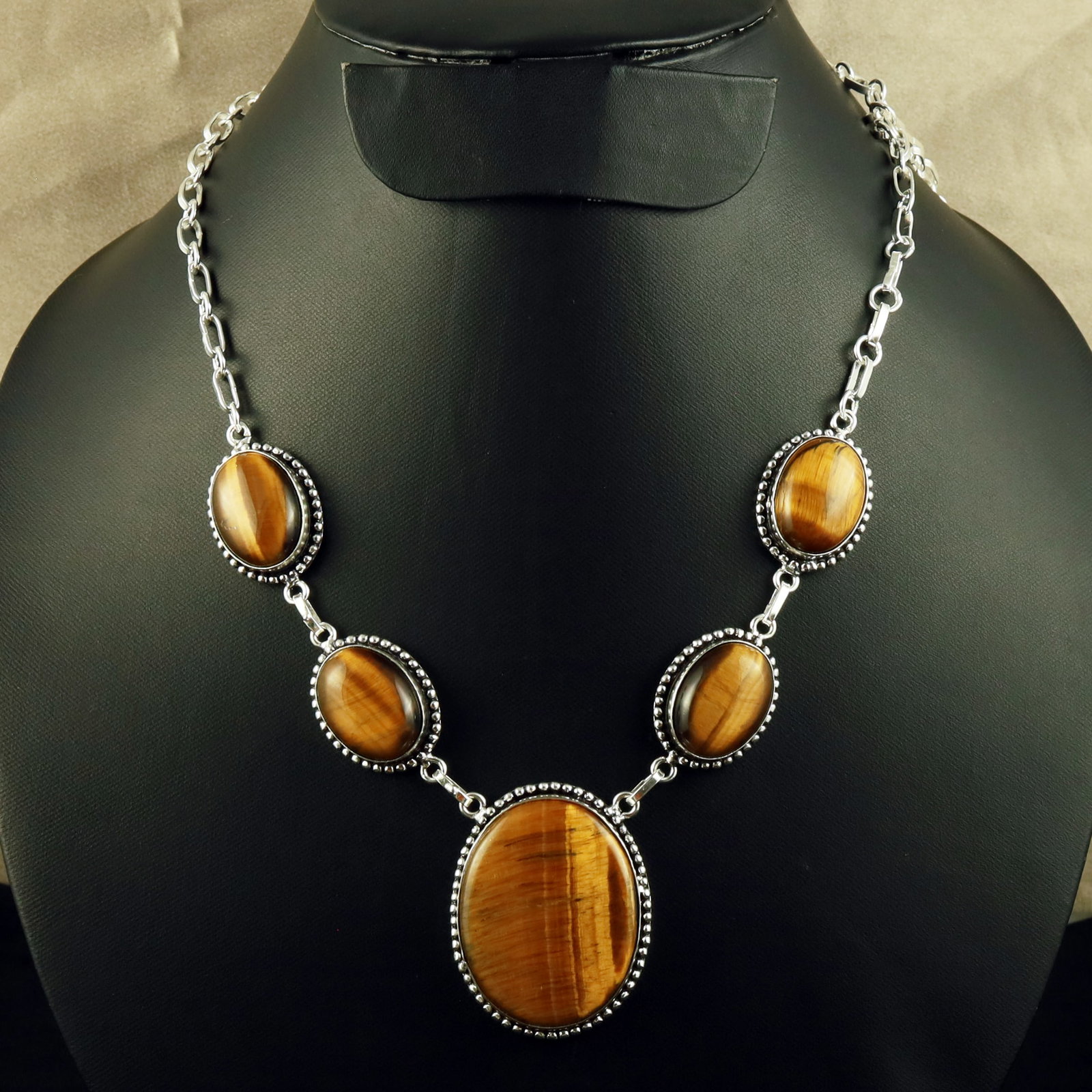 Natural Tiger Eye Sterling Silver Plated Handmade Necklace: Product ID: 260618105637 Product - Handmade Silver Plated Necklace Metal - 92.5 Sterling Silver Plated Necklace Length - 18 Inch Gemstone - Tiger Eye Gemstone Size - 2X1.5 CM (4 Stone), 3.5X3 CM (1 St