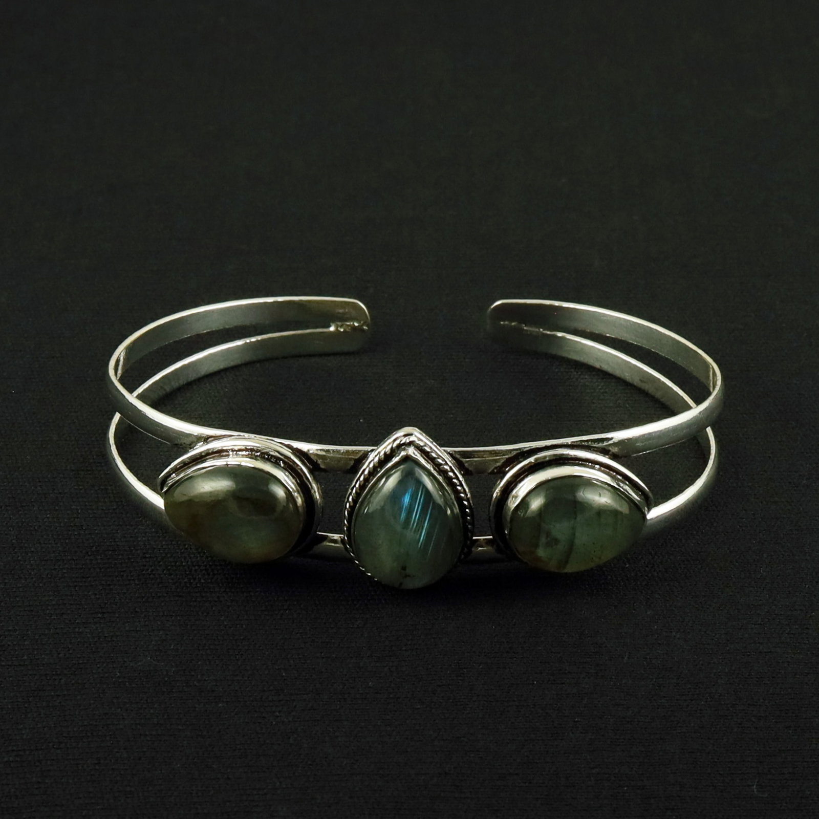 Natural Labradorite Sterling Silver Plated Handmade Cuff Bangle: Product ID: 260612170736 Product - Handmade Silver Plated Cuff Bangle Metal - 92.5 Sterling Silver Plated Bangle Size - 7.5x5 CM (Adjustable) Gemstone - Labradorite Gemstone Origin - Canada Gemstone S