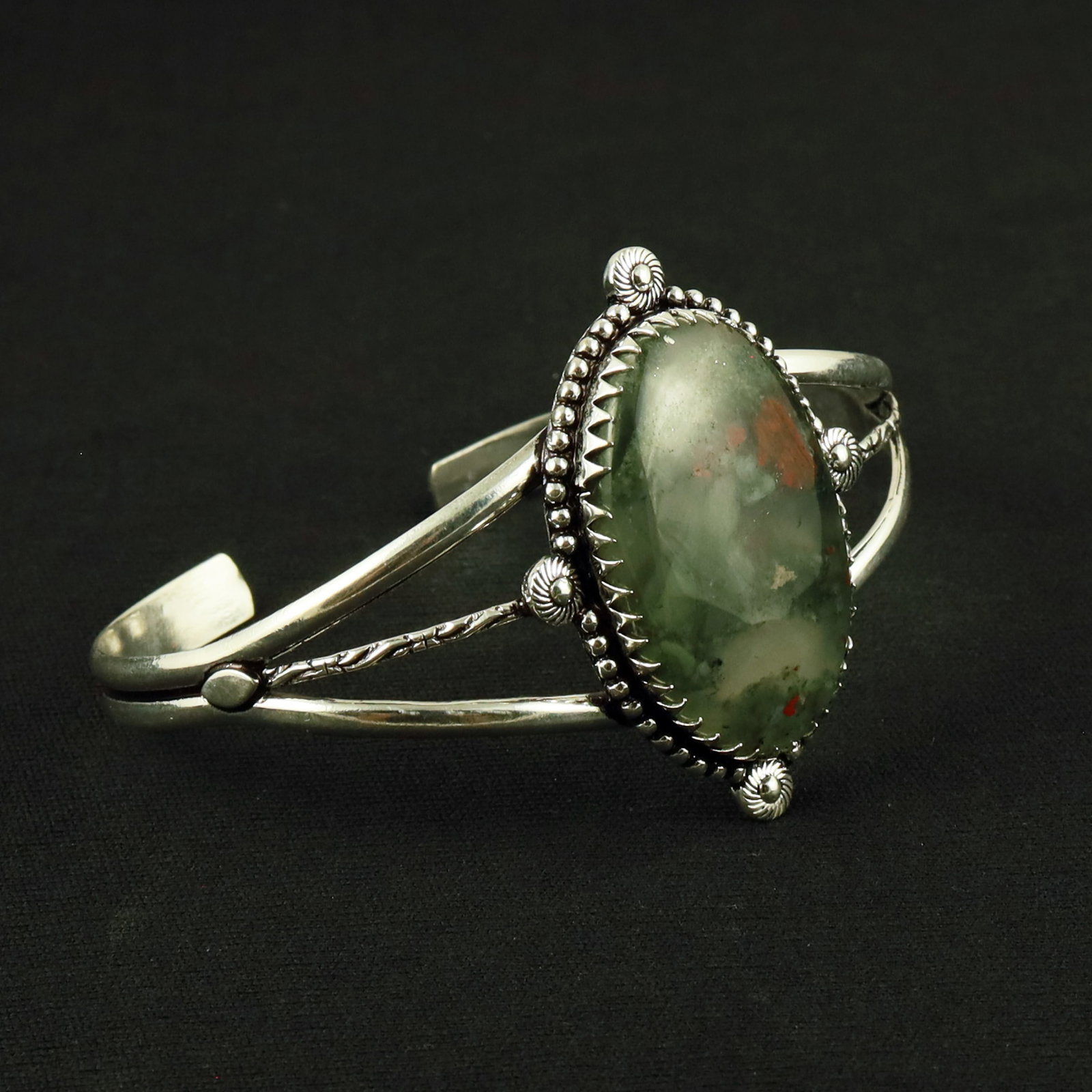 Natural Blood Stone Sterling Silver Plated Handmade Cuff Bangle: Product ID: 260611144641 Product - Handmade Silver Plated Cuff Bangle Metal - 92.5 Sterling Silver Plated Bangle Size - 7.5x5.5 CM (Adjustable) Gemstone - Blood Stone Gemstone Origin - India Gemstone 