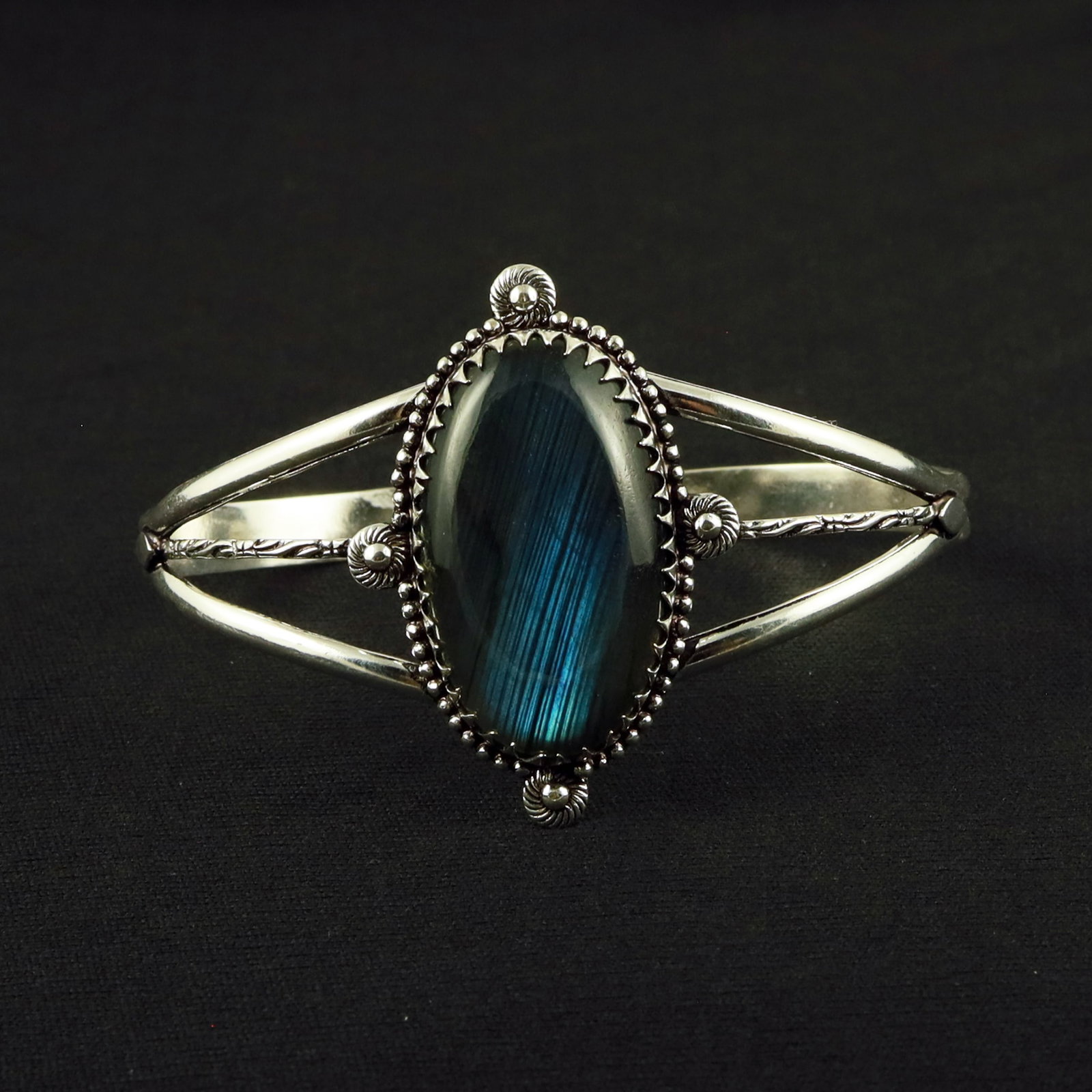 Natural Labradorite Sterling Silver Plated Handmade Cuff Bangle: Product ID: 260611122220 Product - Handmade Silver Plated Cuff Bangle Metal - 92.5 Sterling Silver Plated Bangle Size - 7.5x5.5 CM (Adjustable) Gemstone - Labradorite Gemstone Origin - Canada Gemstone