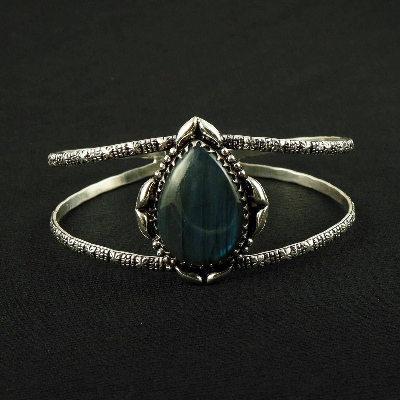 Natural Labradorite Sterling Silver Plated Handmade Cuff Bangle: Product ID: 260611122324 Product - Handmade Silver Plated Cuff Bangle Metal - 92.5 Sterling Silver Plated Bangle Size - 7.5x5.5 CM (Adjustable) Gemstone - Labradorite Gemstone Origin - Canada Gemstone
