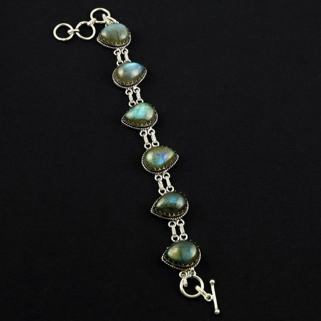 Natural Labradorite Sterling Silver Plated Handmade Bracelet: Product ID: 260608185922 Product - Handmade Silver Plated Bracelet Metal - 92.5 Sterling Silver Plated Bracelet Length - 6 Inch + 2 Inch Gemstone - Labradorite Gemstone Size -12X16 ( 6 Stone) Gemstone