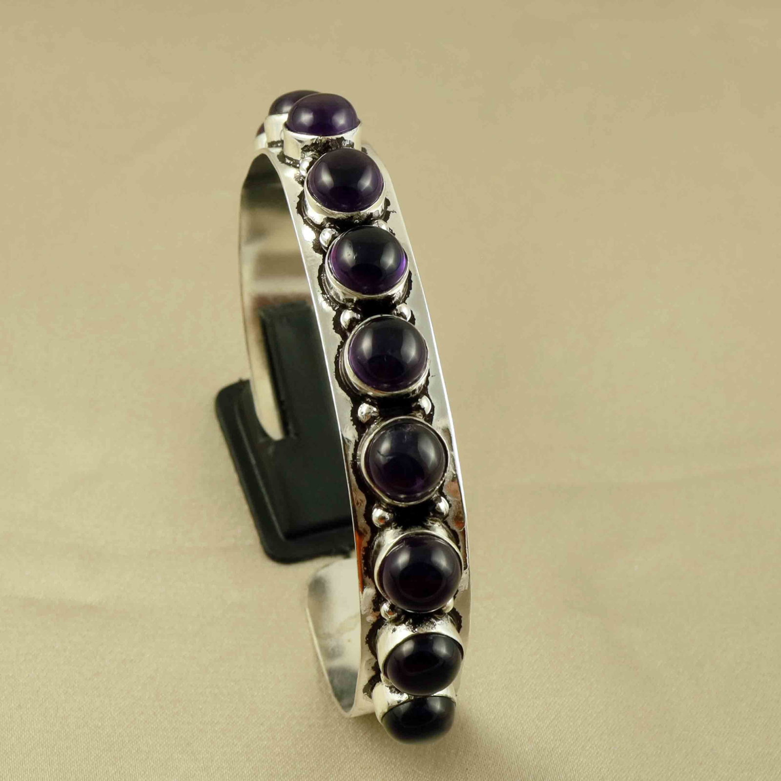 Natural Amethyst Sterling Silver Plated Handmade Cuff Bangle: Product ID: 260607182856 Product - Handmade Silver Plated Cuff Bangle Metal - 92.5 Sterling Silver Plated Bangle Size - 6.5x5.5 CM (Adjustable) Gemstone - Amethyst Gemstone Origin - Brazil Gemstone Si