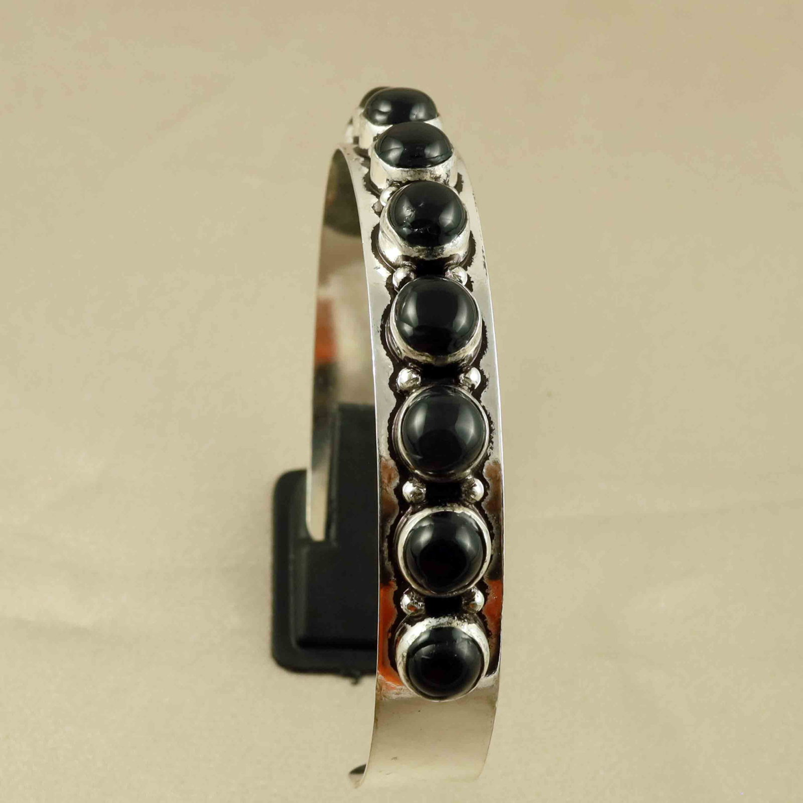 Natural Black Onyx Sterling Silver Plated Handmade Cuff Bangle: Product ID: 260607182536 Product - Handmade Silver Plated Cuff Bangle Metal - 92.5 Sterling Silver Plated Bangle Size - 6.5x5.5 CM (Adjustable) Gemstone - Black Onyx Gemstone Origin - India Gemstone S