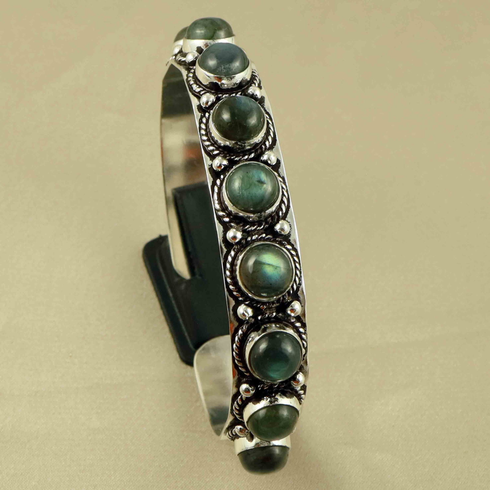 Natural Labradorite Sterling Silver Plated Handmade Cuff Bangle: Product ID: 260607173138 Product - Handmade Silver Plated Cuff Bangle Metal - 92.5 Sterling Silver Plated Bangle Size - 6.5x5.5 CM (Adjustable) Gemstone - Labradorite Gemstone Origin - Canada Gemstone