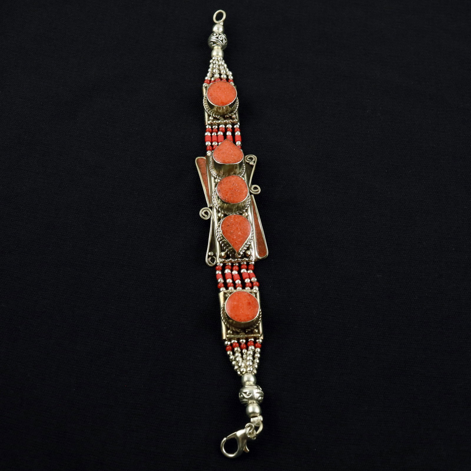 Tibetan Red Coral Handmade Designer Choker Bracelet: Product ID: 260520115123 Product - Tibetan Handmade Ethnic Bracelet Gemstone - Natural Red Coral Size - 7 Inch Weight - 50 Gram Approx Metal - Brass & Copper mix Metal Origin - Nepal Country/Region of
