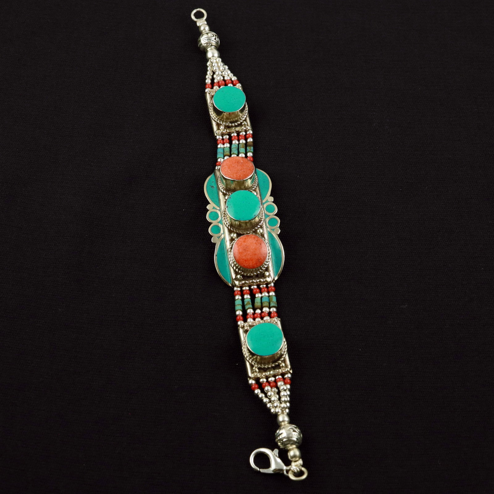 Tibetan Turquoise & Coral Handmade Beaded Boho Bracelet: Product ID: 260520114747 Product - Tibetan Handmade Ethnic Bracelet Gemstone - Natural Turquoise & Coral Size - 7 Inch Weight - 50 Gram Approx Metal - Brass & Copper mix Metal Origin - Nepal Country/R