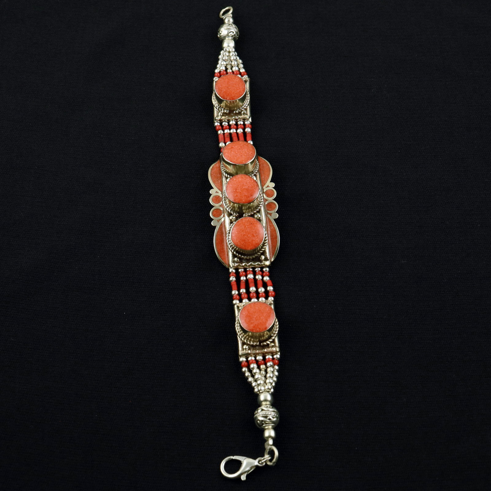 Tibetan Red Coral Handmade Boho-Hippie Bracelet: Product ID: 260520115202 Product - Tibetan Handmade Ethnic Bracelet Gemstone - Natural Coral Size - 7 Inch Weight - 50 Gram Approx Metal - Brass & Copper mix Metal Origin - Nepal Country/Region of Man