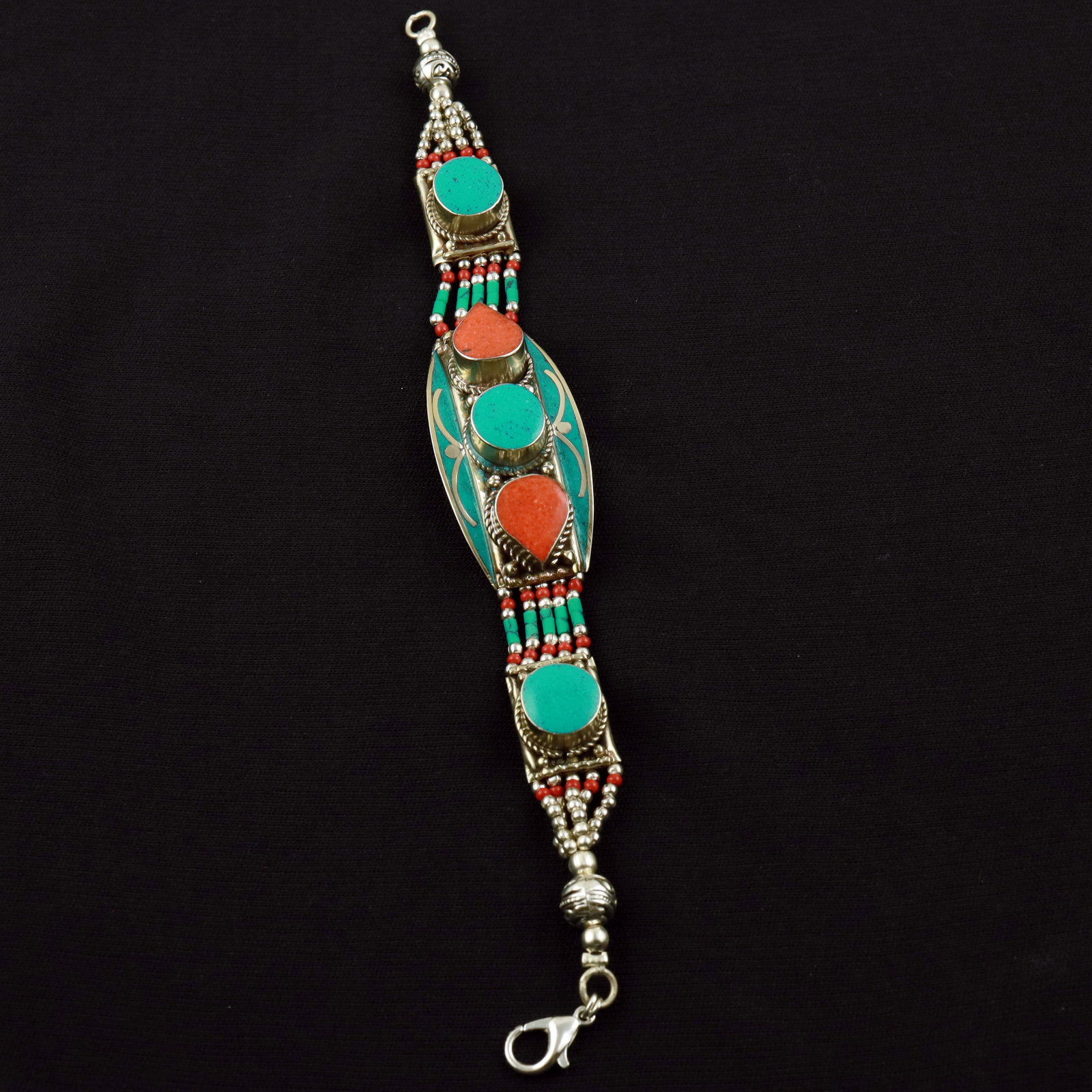 Tibetan Turquoise & Coral Handmade Tribal Bracelet: Product ID: 260520114653 Product - Tibetan Handmade Ethnic Bracelet Gemstone - Natural Turquoise & Coral Size - 7 Inch Weight - 50 Gram Approx Metal - Brass & Copper mix Metal Origin - Nepal Country/R