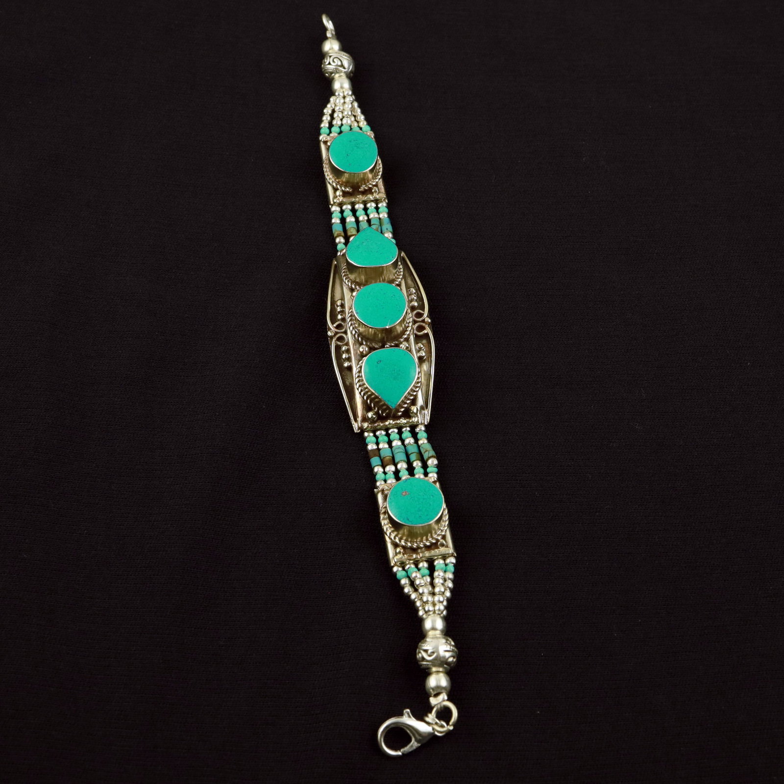 Tibetan Natural Turquoise Handmade Ethnic Bracelet: Product ID: 260520113720 Product - Tibetan Handmade Ethnic Bracelet Gemstone - Natural Turquoise Size - 7 Inch Weight - 50 Gram Approx Metal - Brass & Copper mix Metal Origin - Nepal Country/Region of