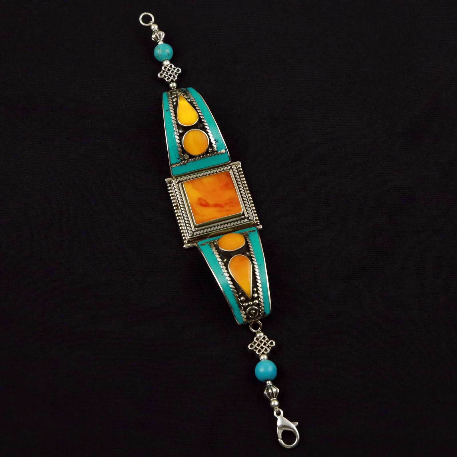 Tibetan Turquoise & Copal Handmade Boho-Hippie Bracelet: Product ID: 260512185618 Product - Tibetan Handmade Ethnic Bracelet Gemstone - Natural Turquoise & Copal Size - 7 Inch Weight - 40 Gram Approx Metal - Brass & Copper mix Metal Origin - Nepal Country/R