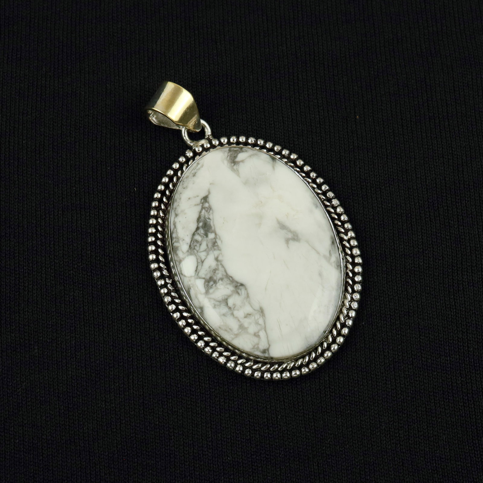Natural Howlite Sterling Silver Plated Handmade Royal Pendant: Product ID: 260513105524 Product - Handmade Silver Plated Pendant Metal - 92.5 Sterling Silver Plated Pendant Size - 4.5x3.5 CM Gemstone - Howlite Gemstone Origin - Canada Gemstone Shape - Oval Pendan