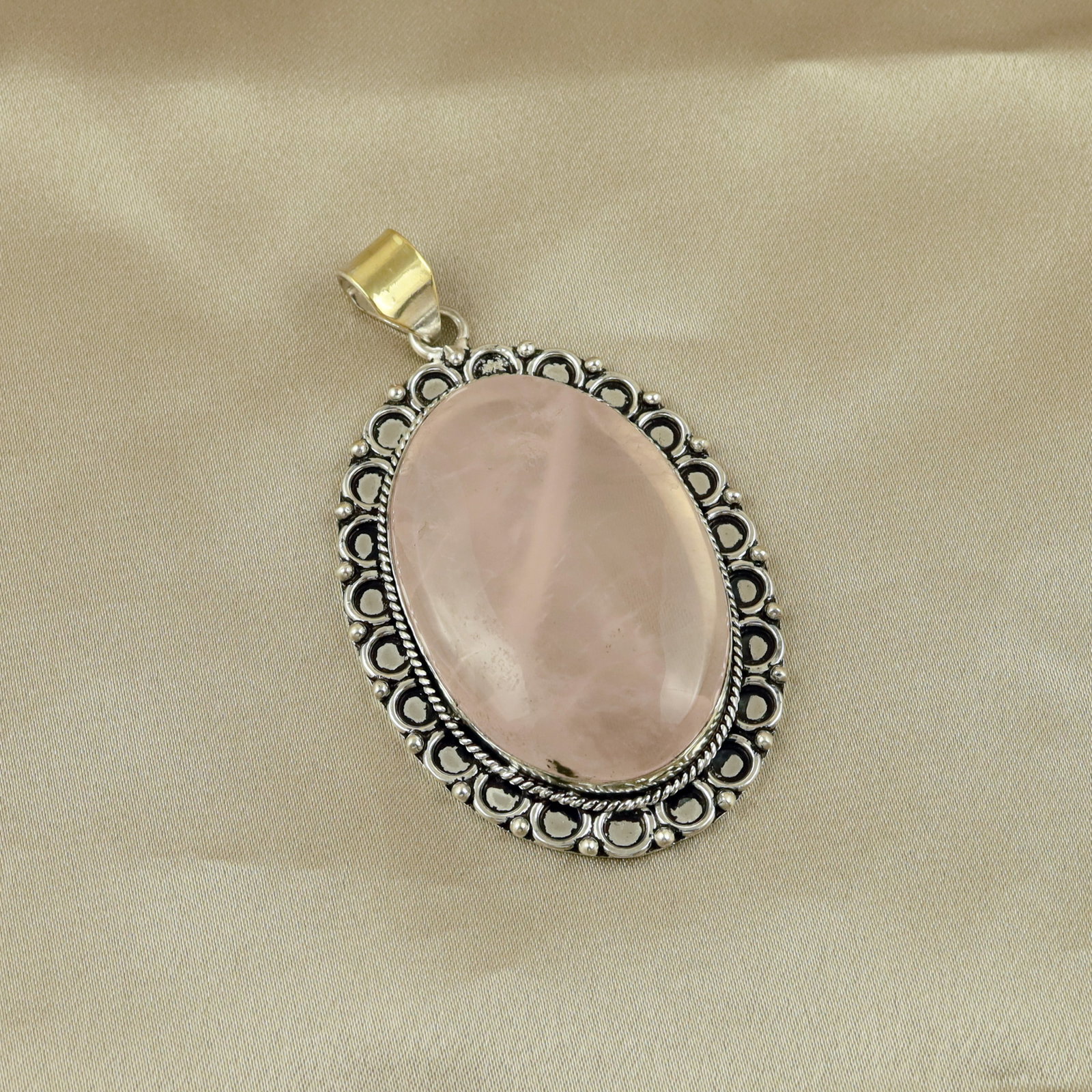 Natural Rose Quartz Sterling Silver Plated Handmade Pendant: Product ID: 260513110410 Product - Handmade Silver Plated Pendant Metal - 92.5 Sterling Silver Plated Pendant Size - 5x3.5 CM Gemstone - Rose Quartz Gemstone Origin - Brazil Gemstone Shape - Oval Pend