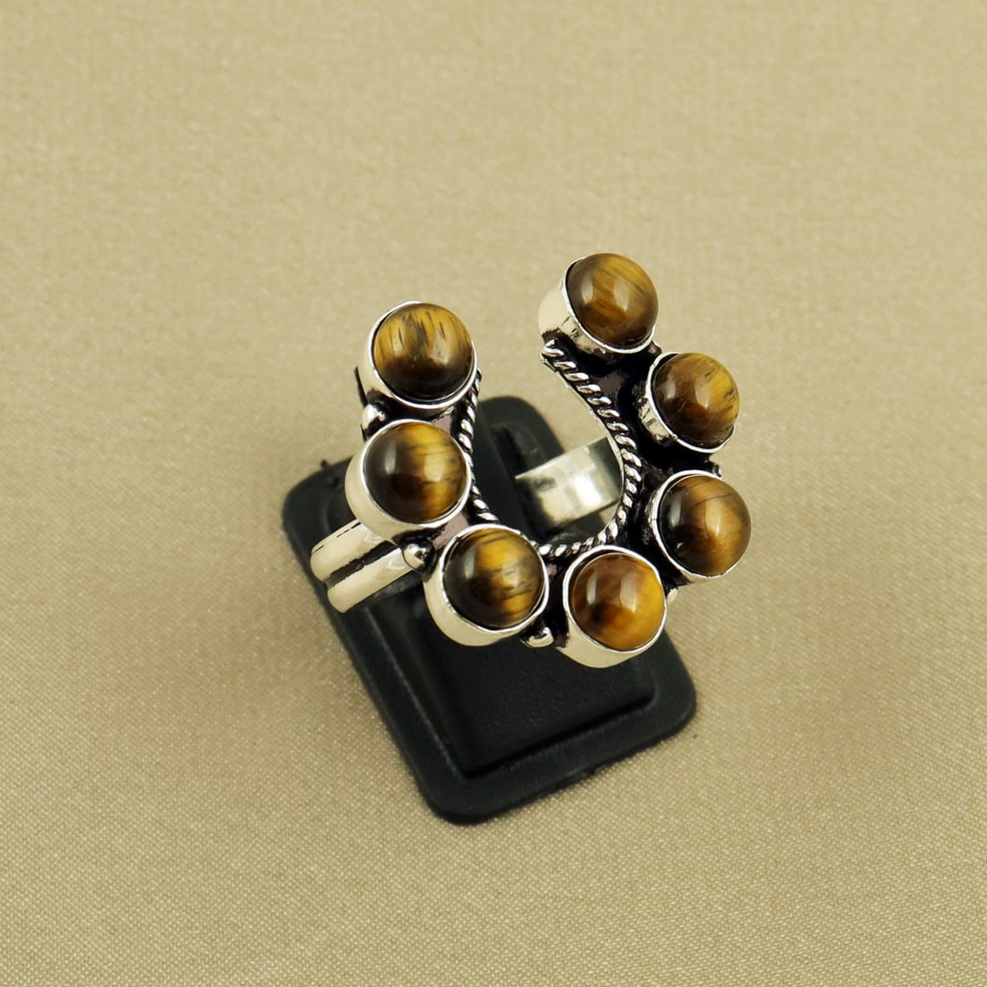 Natural Tiger Eye Sterling Silver Plated Handmade Ring - 10MM ( Adjustable ): Product ID: 260820101716 Product - Handmade Silver Plated Ring Metal - 92.5 Sterling Silver Plated Ring Size - 10MM ( Adjustable ) Gemstone - Tiger Eye Gemstone Origin - Africa Gemstone Size - 6MM ( 7