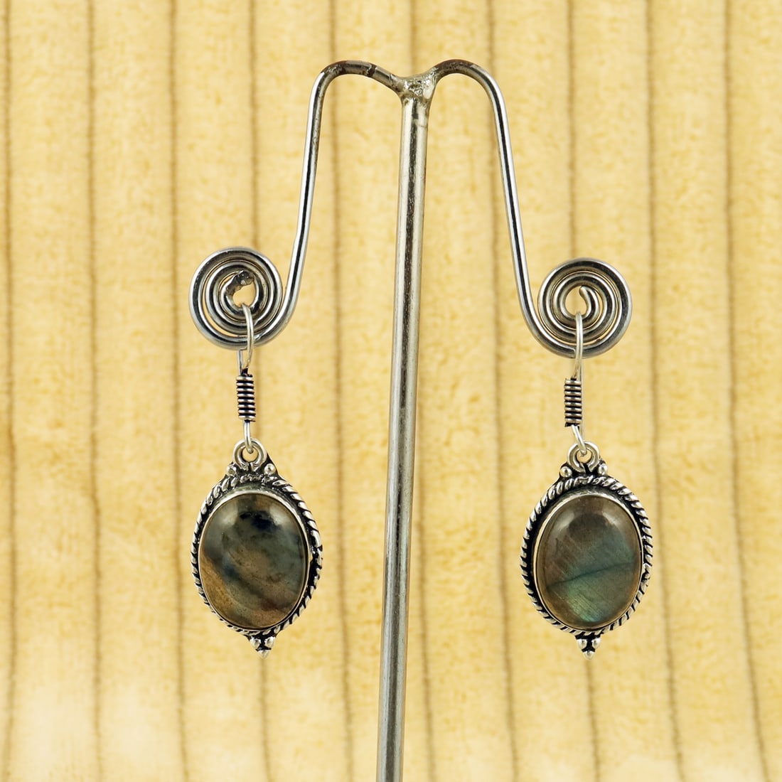 Natural Labradorite Sterling Silver Plated Handmade Stud Earring: Product ID: 260809155055 Product - Handmade Silver Plated Stud Earring Metal - 92.5 Sterling Silver Plated Earring Type - Stud Gemstone - Labradorite Gemstone Origin - Canada Gemstone Size - 12X16 MM 