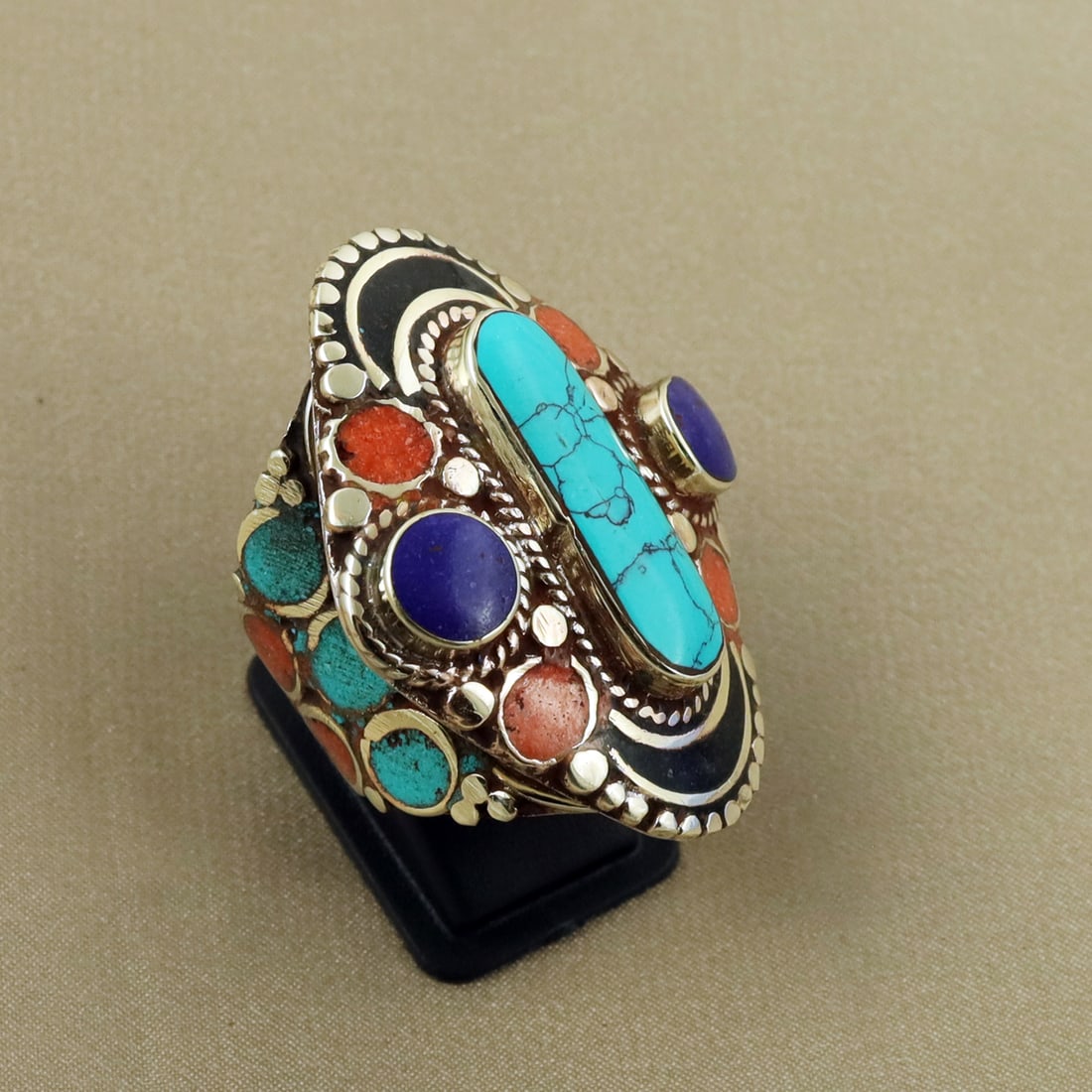 Tibetan Turquoise, Coral & Black Onyx & Lapis Lazuli Handmade Ethnic Ring - Free Size: Product ID: 260822130358 Product - Tibetan Handmade Ethnic Ring Ring Size - Free Size Ring Weight - 20 Gram Gemstone - Turquoise & Coral & Black Onyx & Lapis Lazuli Metal - Brass & Copper mix Metal Or