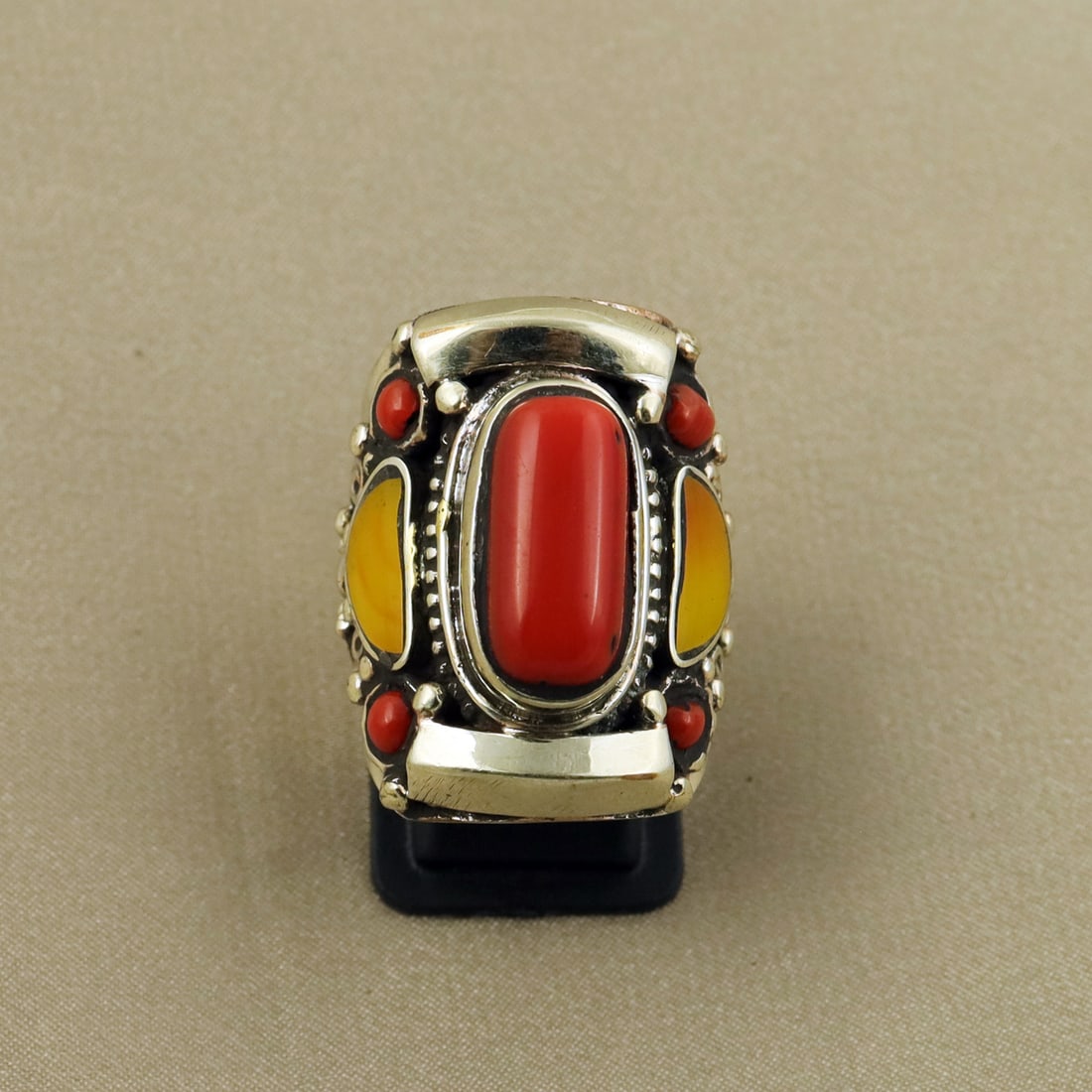 Tibetan Copal & Red Coral Handmade Ethnic Choker Ring - 9MM: Product ID: 260822125835 Product - Tibetan Handmade Ethnic Ring Ring Size - 9MM Ring Weight - 21 Gram Gemstone - Copal & Coral Metal - Brass & Copper mix Metal Origin - Nepal Country/Region of Manufac