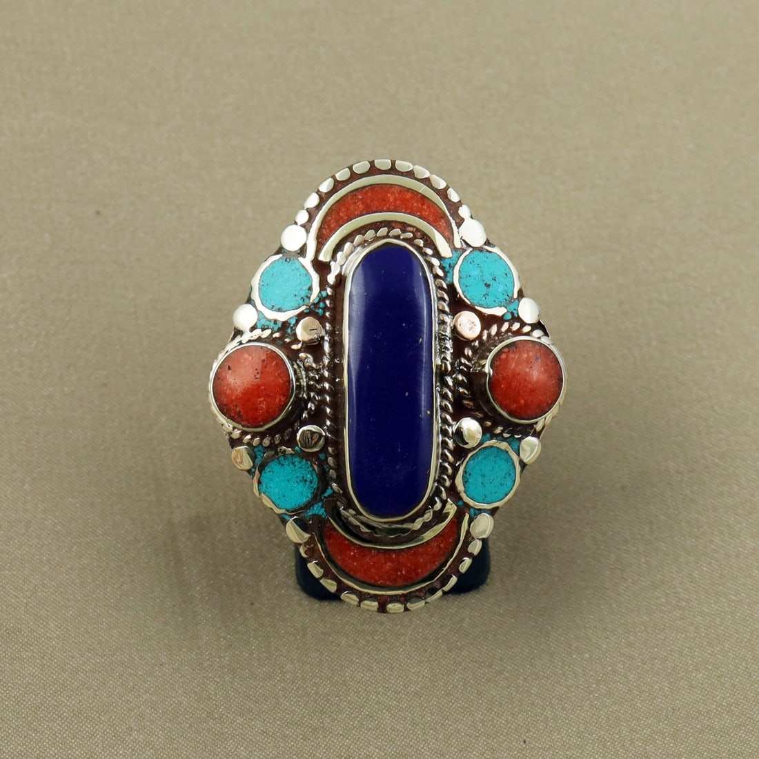 Tibetan Turquoise, Coral & Lapis Lazuli Handmade Ethnic Ring - Free Size: Product ID: 260822130116 Product - Tibetan Handmade Ethnic Ring Ring Size - Free Size Ring Weight - 20 Gram Gemstone - Turquoise & Coral & Lapis Lazuli Metal - Brass & Copper mix Metal Origin - Nepal 