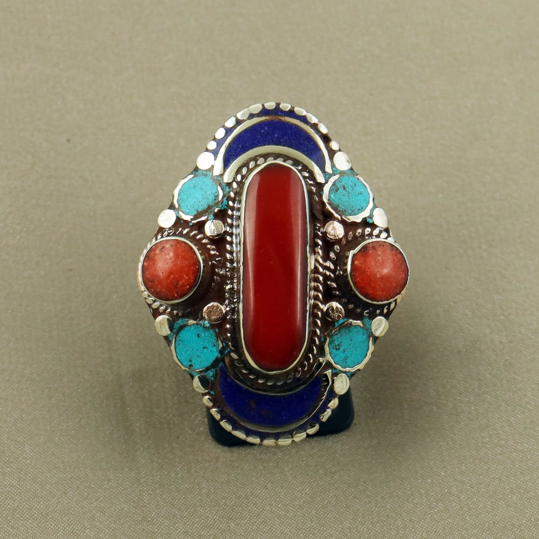 Tibetan Turquoise, Coral & Lapis Lazuli Handmade Ethnic Ring - Free Size: Product ID: 260822130148 Product - Tibetan Handmade Ethnic Ring Ring Size - Free Size Ring Weight - 20 Gram Gemstone - Turquoise & Coral & Lapis Lazuli Metal - Brass & Copper mix Metal Origin - Nepal 