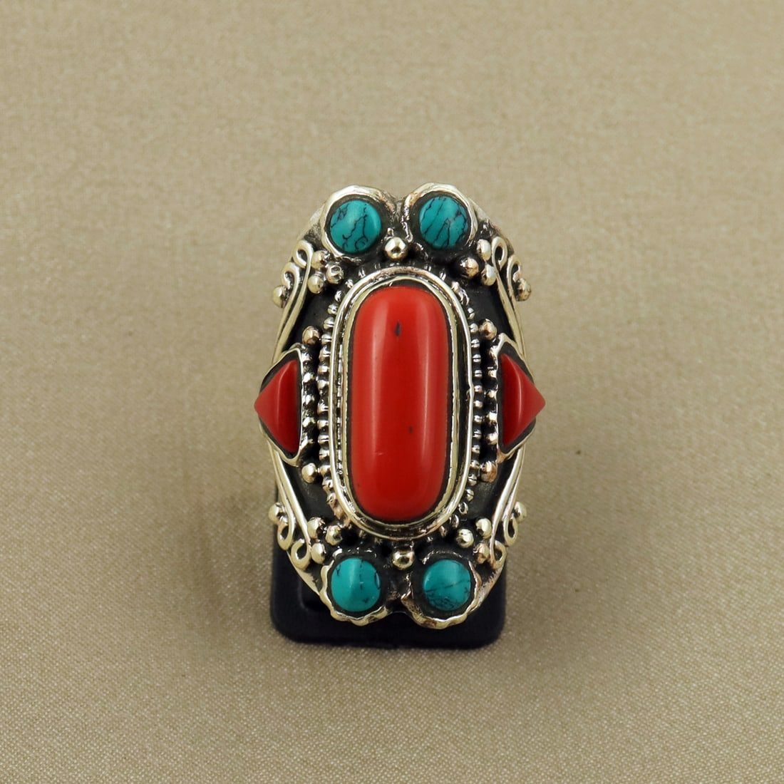 Tibetan Turquoise & Coral Handmade Ethnic Bold Ring - 7MM: Product ID: 260822125051 Product - Tibetan Handmade Ethnic Ring Ring Size - 7MM Ring Weight - 14 Gram Gemstone - Turquoise & Coral Metal - Brass & Copper mix Metal Origin - Nepal Country/Region of Man