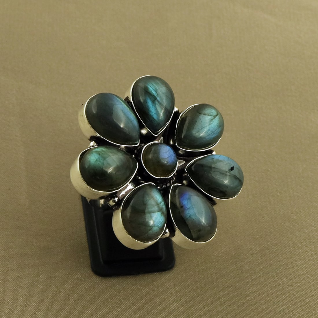 Natural Labradorite Sterling Silver Plated Handmade Ring - 7MM: Product ID: 260821135635 Product - Handmade Silver Plated Ring Metal - 92.5 Sterling Silver Plated Ring Size - 7MM Gemstone - Labradorite Gemstone Origin - Canada Gemstone Size - 10X14 MM ( 7 Stone ) 