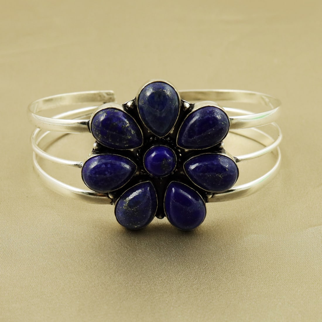 Natural Lapis Lazuli Sterling Silver Plated Handmade Cuff Bangle: Product ID: 260819180800 Product - Handmade Silver Plated Cuff Bangle Metal - 92.5 Sterling Silver Plated Bangle Size - 7x5 CM (Adjustable) Gemstone - Lapis Lazuli Gemstone Origin - Afghanistan Gemsto