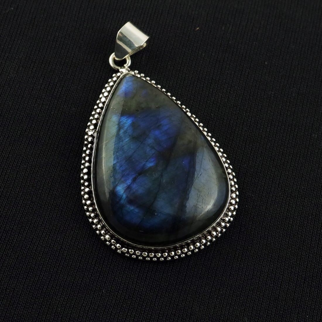 Natural Labradorite Sterling Silver Plated Handmade Pendant: Product ID: 260818144029 Product - Handmade Silver Plated Pendant Metal - 92.5 Sterling Silver Plated Gemstone - Labradorite Gemstone Origin - Canada Gemstone Shape - Pear Gemstone Size - 4.5X3 CM Pen