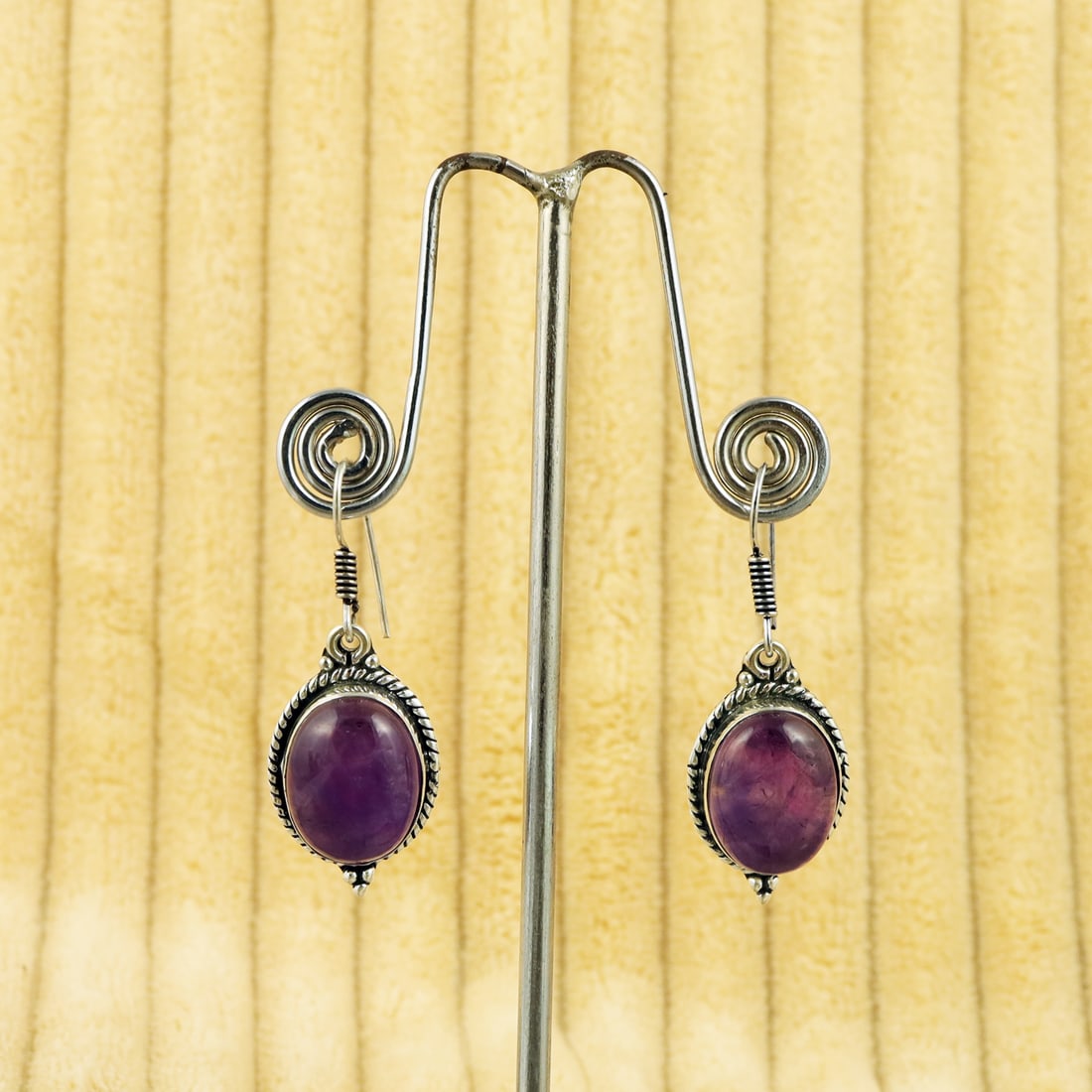 Natural Amethyst Sterling Silver Plated Handmade Stud Earring: Product ID: 260809155552 Product - Handmade Silver Plated Stud Earring Metal - 92.5 Sterling Silver Plated Earring Type - Stud Gemstone - Amethyst Gemstone Origin - Africa Gemstone Size - 12X16 MM ( 2