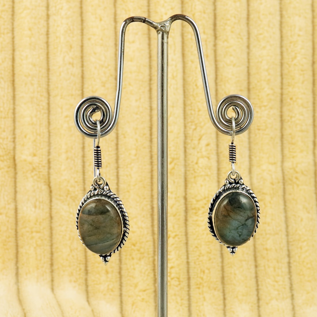 Natural Labradorite Sterling Silver Plated Handmade Stud Earring: Product ID: 260809155026 Product - Handmade Silver Plated Stud Earring Metal - 92.5 Sterling Silver Plated Earring Type - Stud Gemstone - Labradorite Gemstone Origin - Canada Gemstone Size - 12X16 MM 