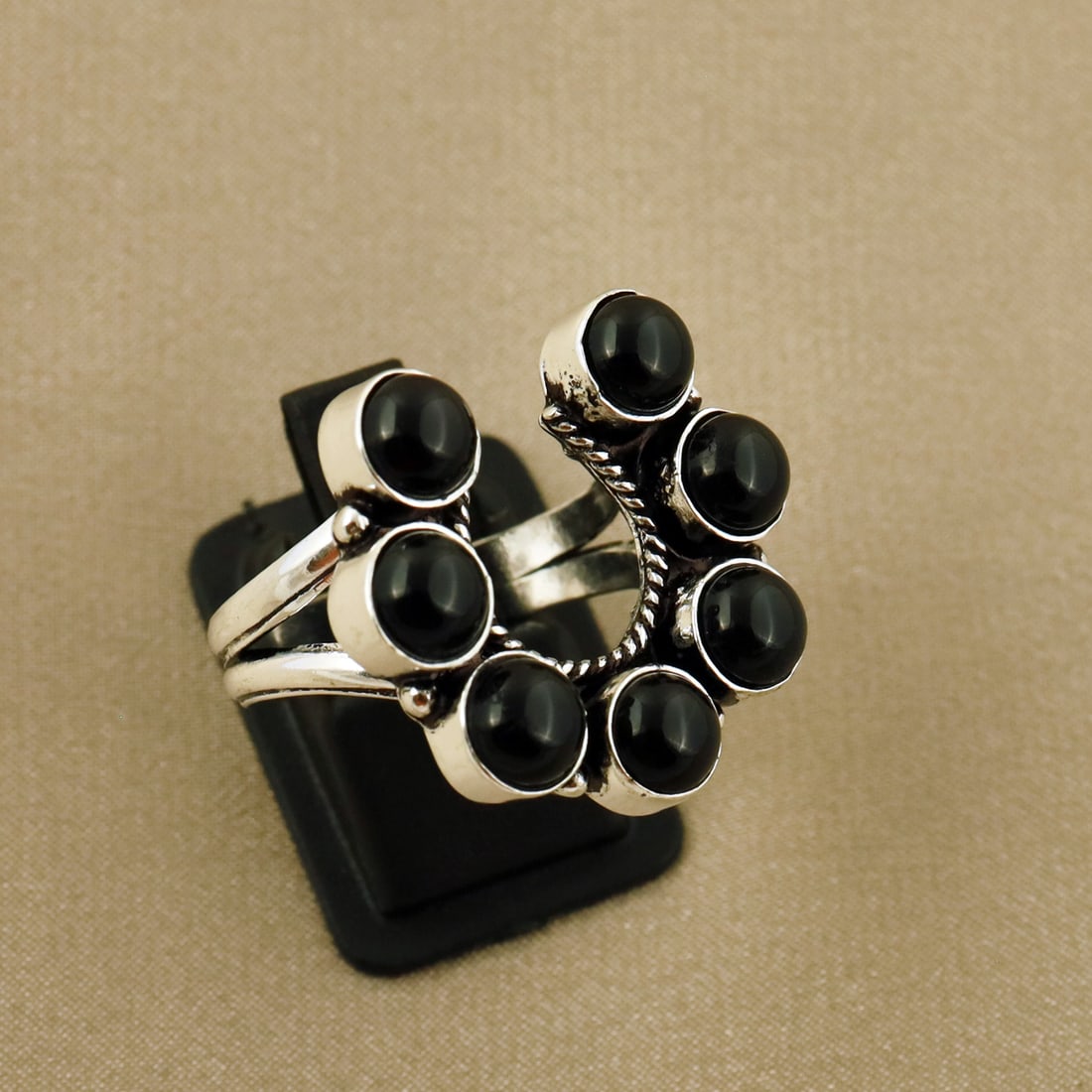 Natural Black Onyx Sterling Silver Plated Handmade Ring - 10MM: Product ID: 260808133537 Product - Handmade Silver Plated Ring Metal - 92.5 Sterling Silver Plated Ring Size - 10MM Gemstone - Black Onyx Gemstone Origin - India Gemstone Size - 6MM ( 7 Stone ) Gemsto
