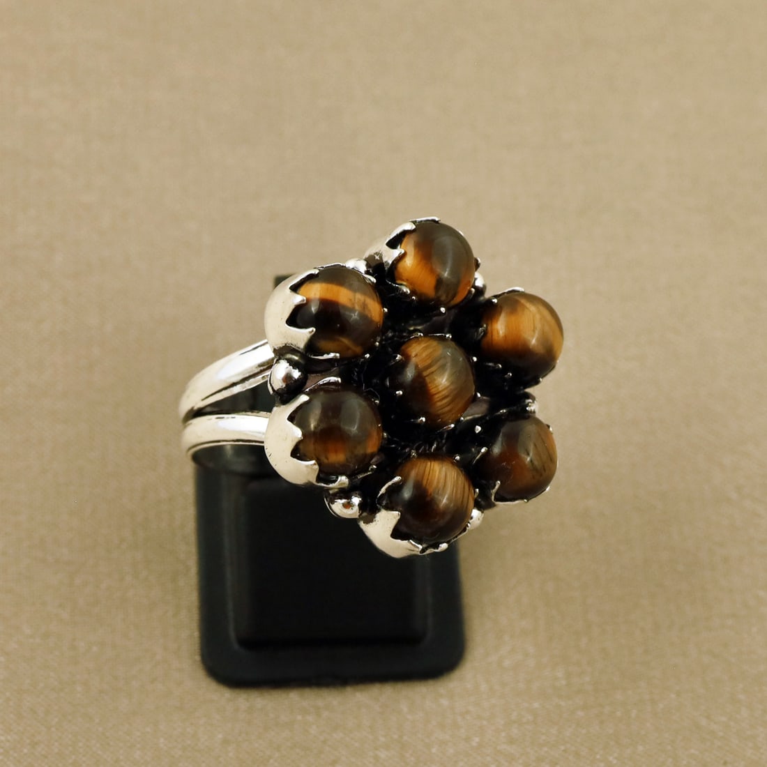 Natural Tiger Eye Sterling Silver Plated Handmade Ring - 7.5MM: Product ID: 260808125202 Product - Handmade Silver Plated Ring Metal - 92.5 Sterling Silver Plated Ring Size - 7.5MM Gemstone - Tiger Eye Gemstone Origin - Africa Gemstone Size - 6MM ( 7 Stone ) Gemst