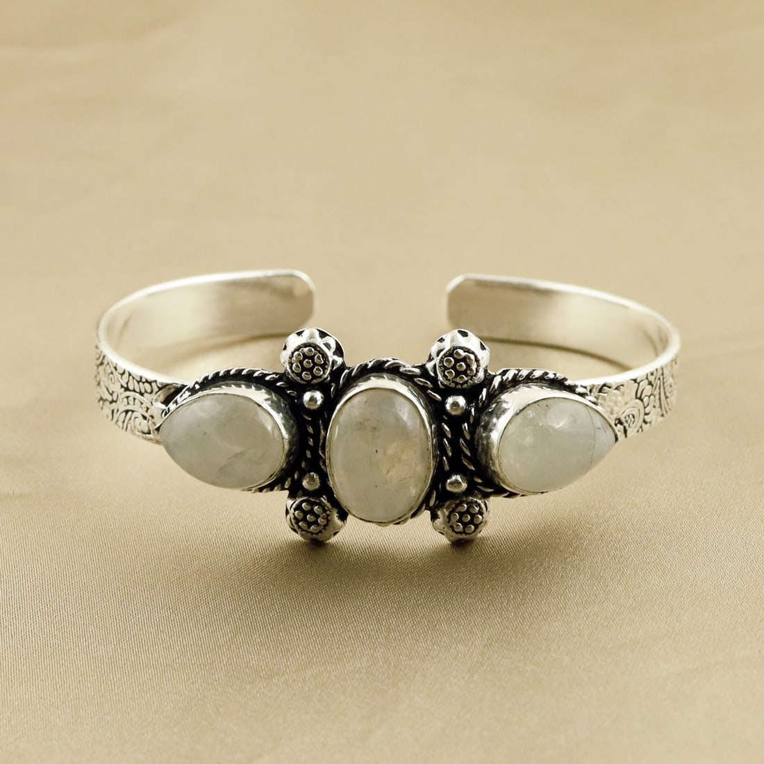 Natural Rainbow Moonstone Sterling Silver Plated Handmade Cuff Bangle: Product ID: 260807164853 Product - Handmade Silver Plated Cuff Bangle Metal - 92.5 Sterling Silver Plated Bangle Size - 7x5 CM (Adjustable) Gemstone - Rainbow Moonstone Gemstone Origin - India Gemston