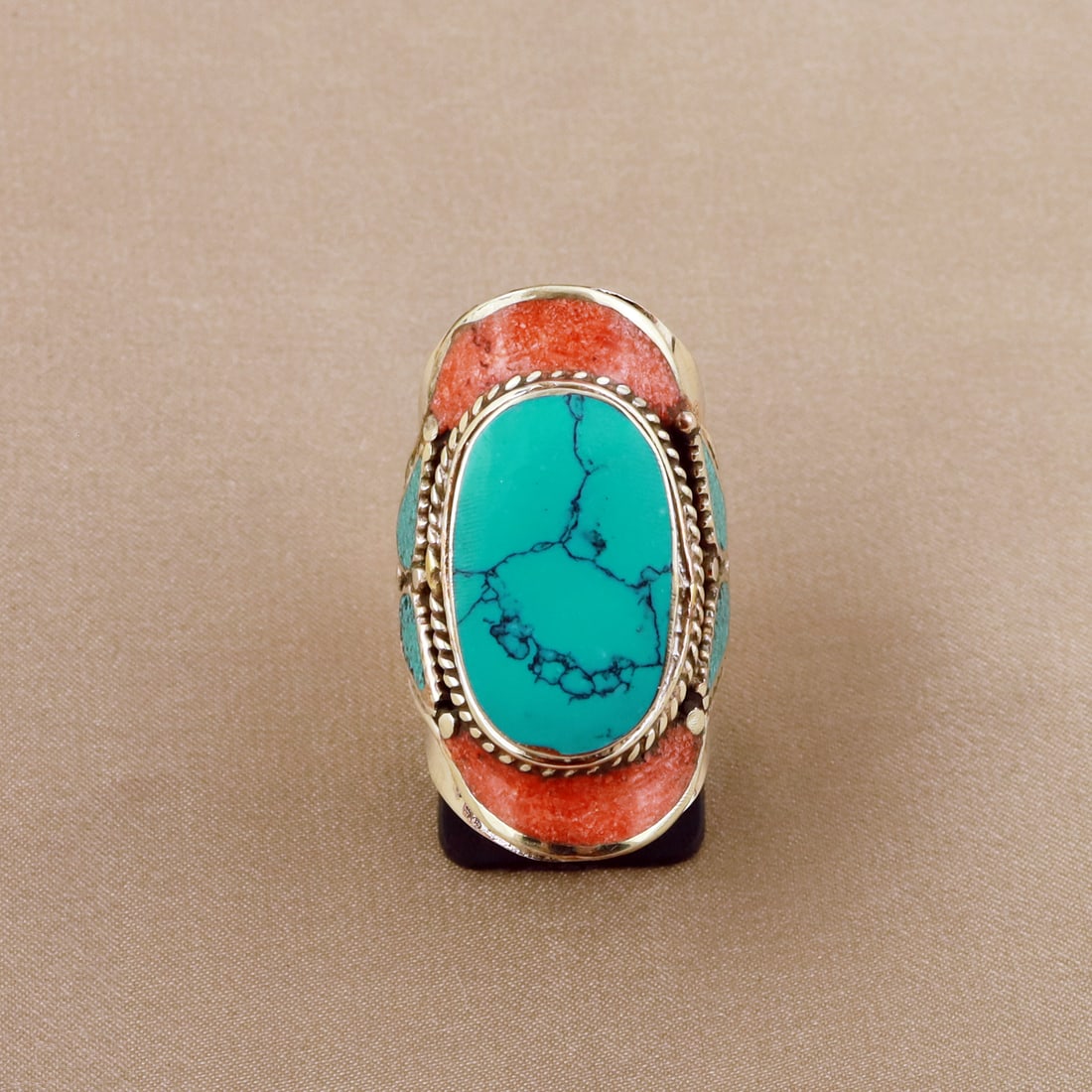Tibetan Turquoise & Coral Handmade Ethnic Ring - 9MM: Product ID: 260804125807 Product - Tibetan Handmade Ethnic Ring Ring Size -9MM Ring Weight - 18 Gram Gemstone - Turquoise & Coral Metal - Brass & Copper mix Metal Origin - Nepal Country/Region of Manu