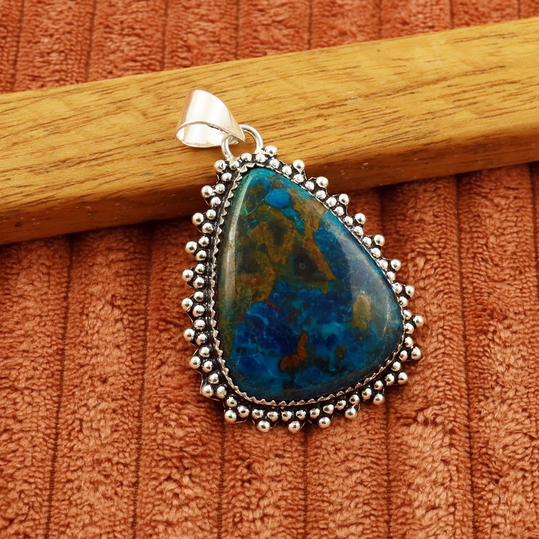 Natural Shattuckite 2 Micron Sterling Silver Plated Handmade Pendant: Product ID: 260802151946 Product - Handmade Silver Plated Pendant Metal - 92.5 2 Micron Sterling Silver Plated Gemstone - Shattuckite Gemstone Origin - United Sates Gemstone Shape - Pear Gemstone Size