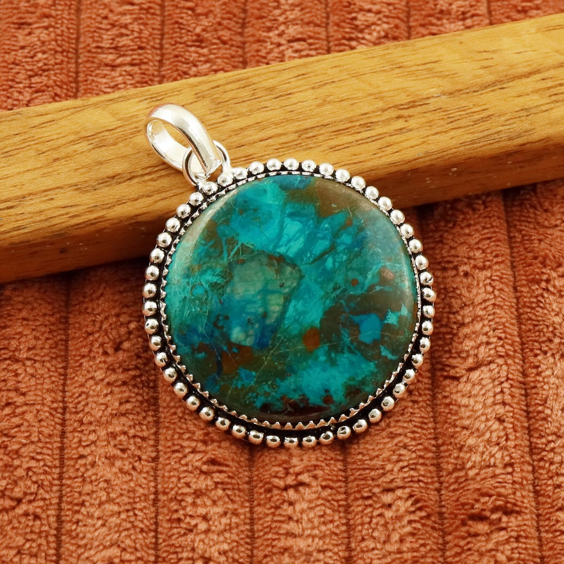 Natural Shattuckite 2 Micron Sterling Silver Plated Handmade Pendant: Product ID: 260802151843 Product - Handmade Silver Plated Pendant Metal - 92.5 2 Micron Sterling Silver Plated Gemstone - Shattuckite Gemstone Origin - United Sates Gemstone Shape - Round Gemstone Siz