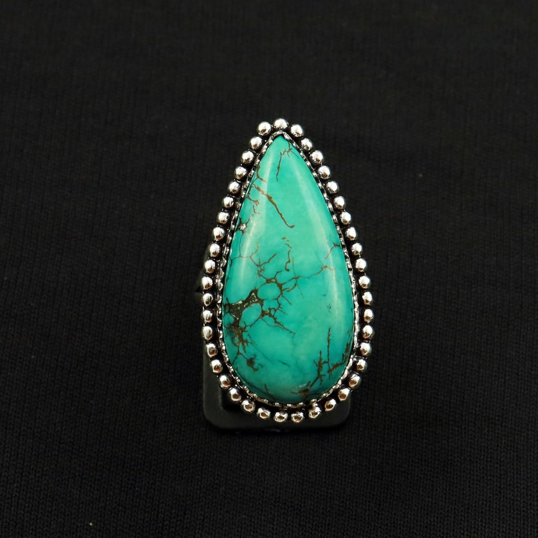 Natural Turquoise 2 Micron Sterling Silver Plated Handmade Ring - 7.5MM: Product ID: 260802141838 Product - Handmade Silver Plated Ring Metal - 92.5 2 Micron Sterling Silver Plated Ring Size - 7.5MM Gemstone - Turquoise Gemstone Origin - Tibet Gemstone Size - 3.5X1.5 CM Ge