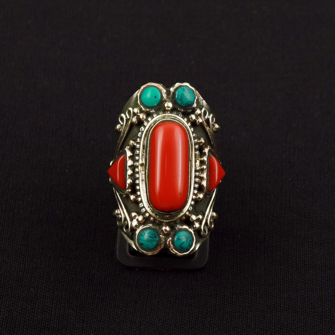 Tibetan Turquoise & Coral Handmade Ethnic Ring - 8MM: Product ID: 260801130545 Product - Tibetan Handmade Ethnic Ring Ring Size - 8MM Ring Weight - 15 Gram Gemstone - Turquoise & Coral Metal - Brass & Copper mix Metal Origin - Nepal Country/Region of Man