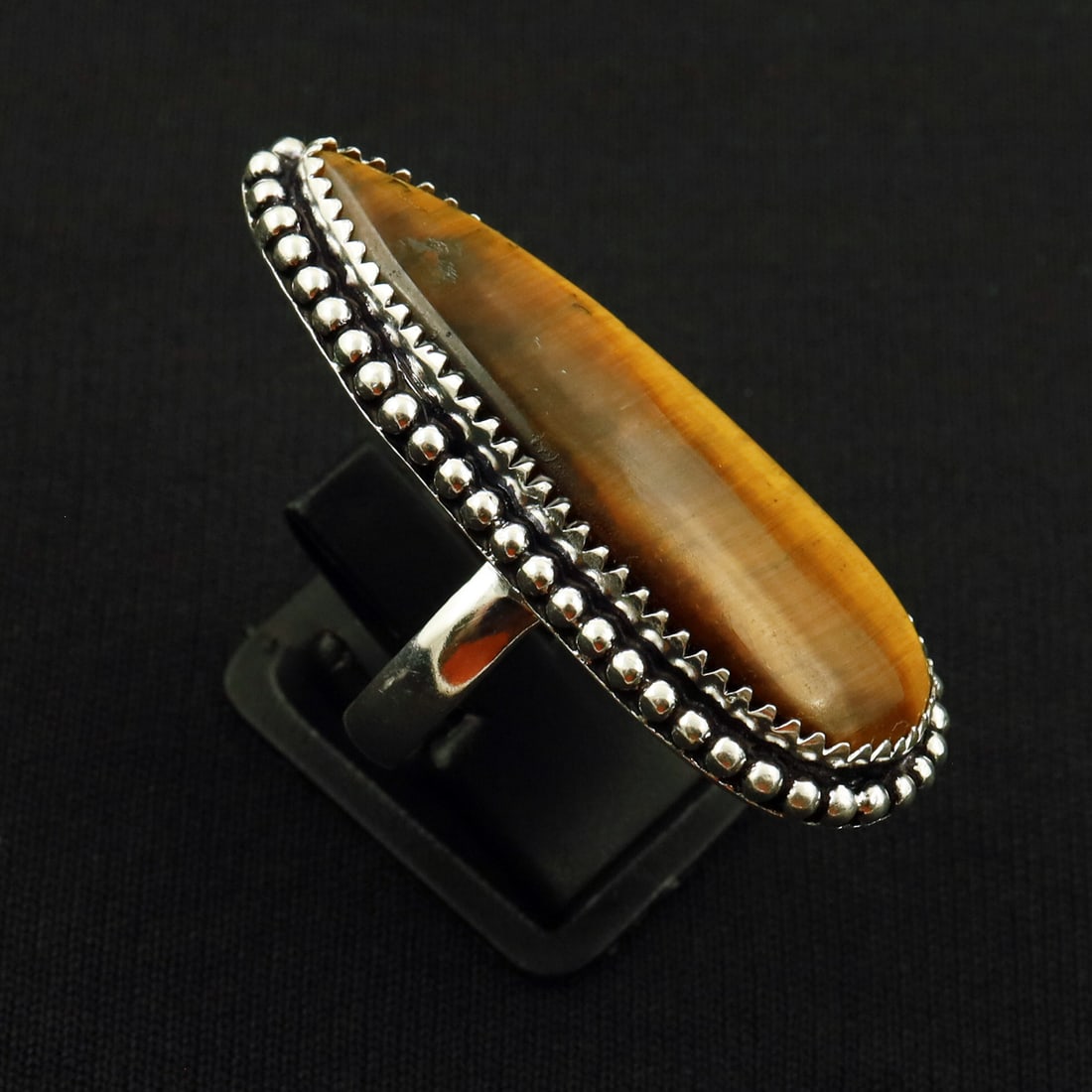 Natural Tiger Eye Sterling Silver 2-Micron Plated Handmade Ring - 9MM: Product ID: 260722120714 Product - Handmade Silver Plated Ring Metal - 92.5 2-Micron Sterling Silver Plated Ring Size - 9MM Gemstone - Tiger Eye Gemstone Origin - South Africa Gemstone Size - 4.5X1.5 