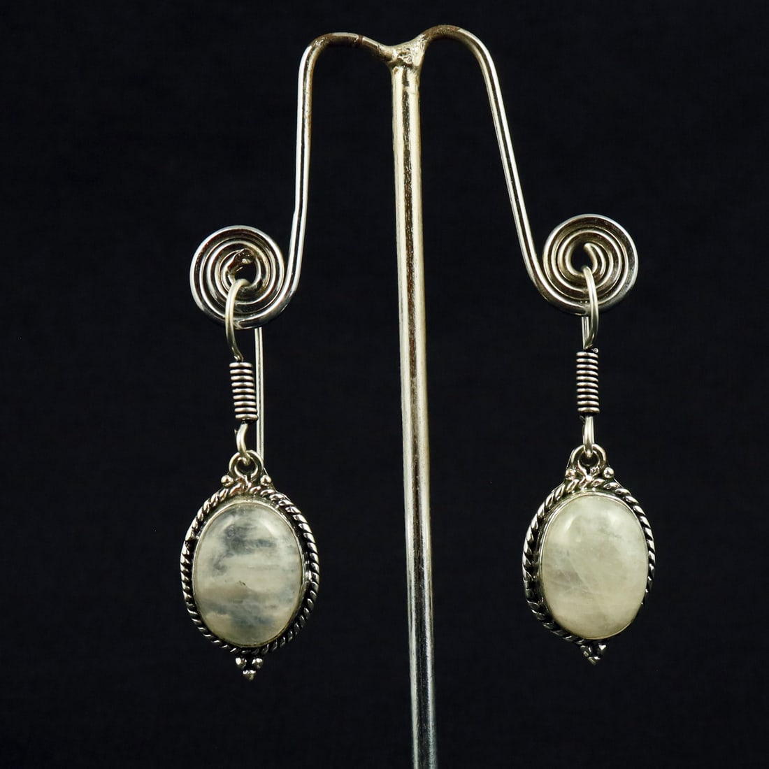 Natural Rainbow Moonstone Sterling Silver Plated Handmade Stud Earring: Product ID: 260722101154 Product - Handmade Silver Plated Stud Earring Metal - 92.5 Sterling Silver Plated Earring Type - Stud Gemstone -Rainbow Moonstone Gemstone Origin - India Gemstone Size - 12X16