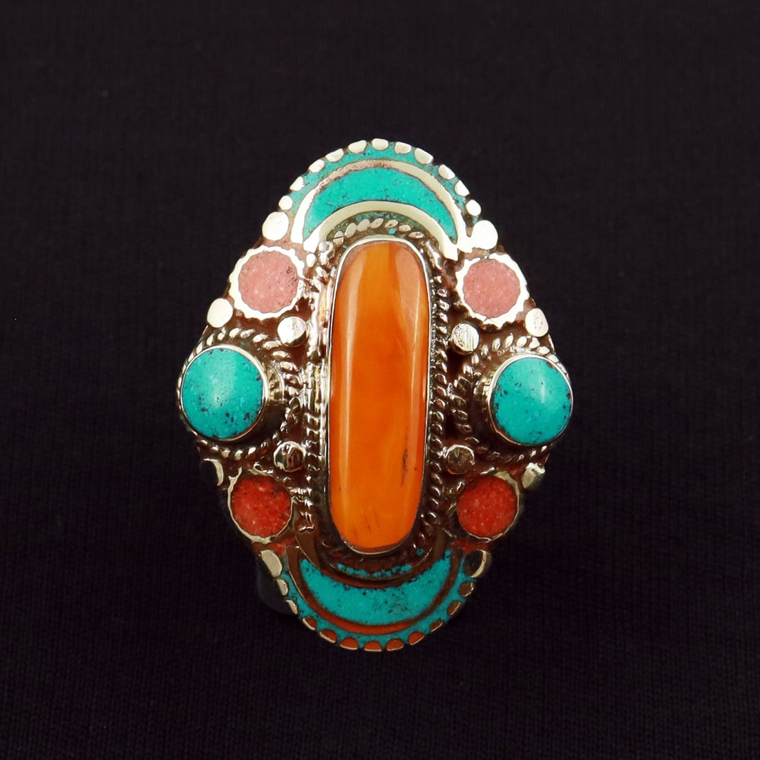 Tibetan Turquoise & Coral & Copal Handmade Ethnic Ring - Free Size: Product ID: 260721173755 Product - Tibetan Handmade Ethnic Ring Ring Size - Free Size Ring Weight - 21 Gram Gemstone - Turquoise & Coral & Copal Metal - Brass & Copper mix Metal Origin - Nepal Country