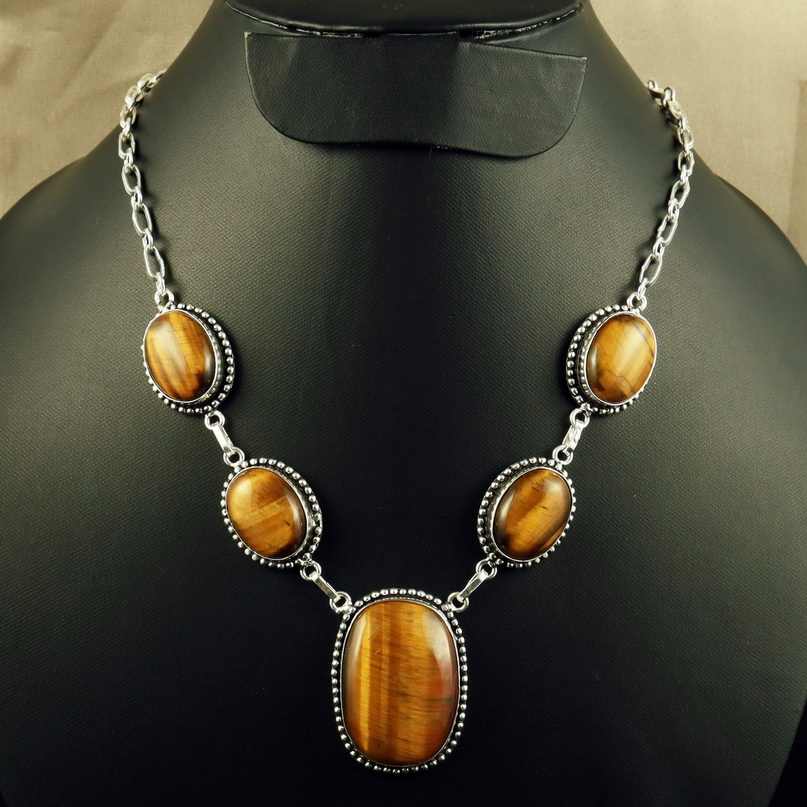 Natural Tiger Eye Sterling Silver Plated Handmade Necklace: Product ID: 260701150800 Product - Handmade Silver Plated Necklace Metal - 92.5 Sterling Silver Plated Necklace Length - 18 Inch Gemstone - Tiger Eye Gemstone Size - 2X1.5 CM (4 Stone), 3.5X2.5 CM (1 