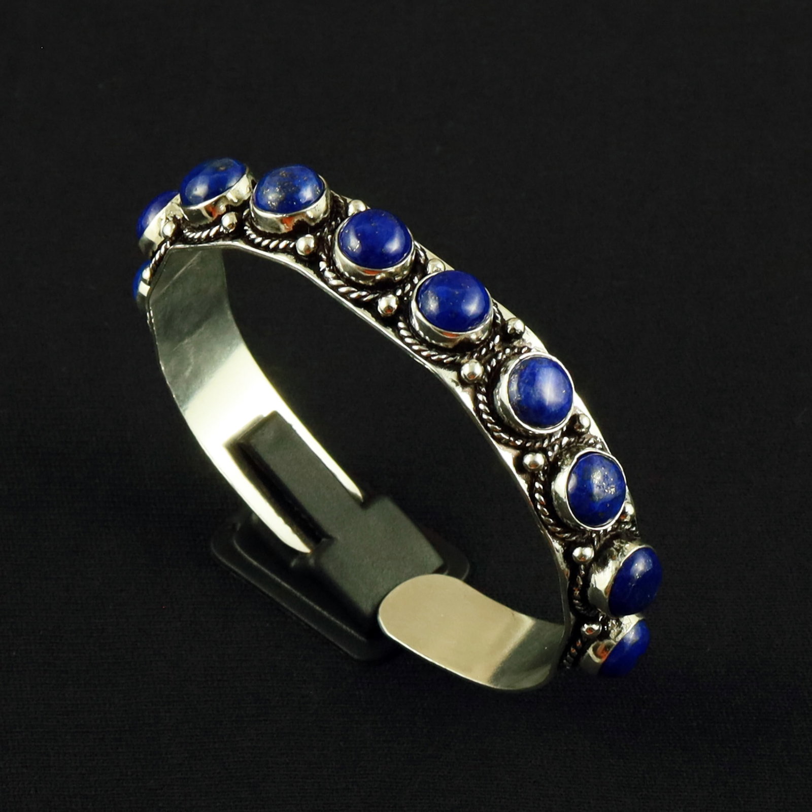Natural Lapis Lazuli Sterling Silver Plated Handmade Cuff Bangle: Product ID: 260618144327 Product - Handmade Silver Plated Cuff Bangle Metal - 92.5 Sterling Silver Plated Bangle Size - 6x5.5 CM (Adjustable) Gemstone - Howlite Gemstone Origin - Canada Gemstone Size 