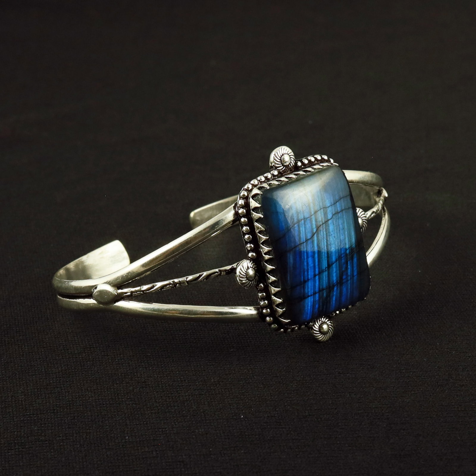 Natural Labradorite Sterling Silver Plated Handmade Cuff Bangle: Product ID: 260611122052 Product - Handmade Silver Plated Cuff Bangle Metal - 92.5 Sterling Silver Plated Bangle Size - 7.5x5.5 CM (Adjustable) Gemstone - Labradorite Gemstone Origin - Canada Gemstone
